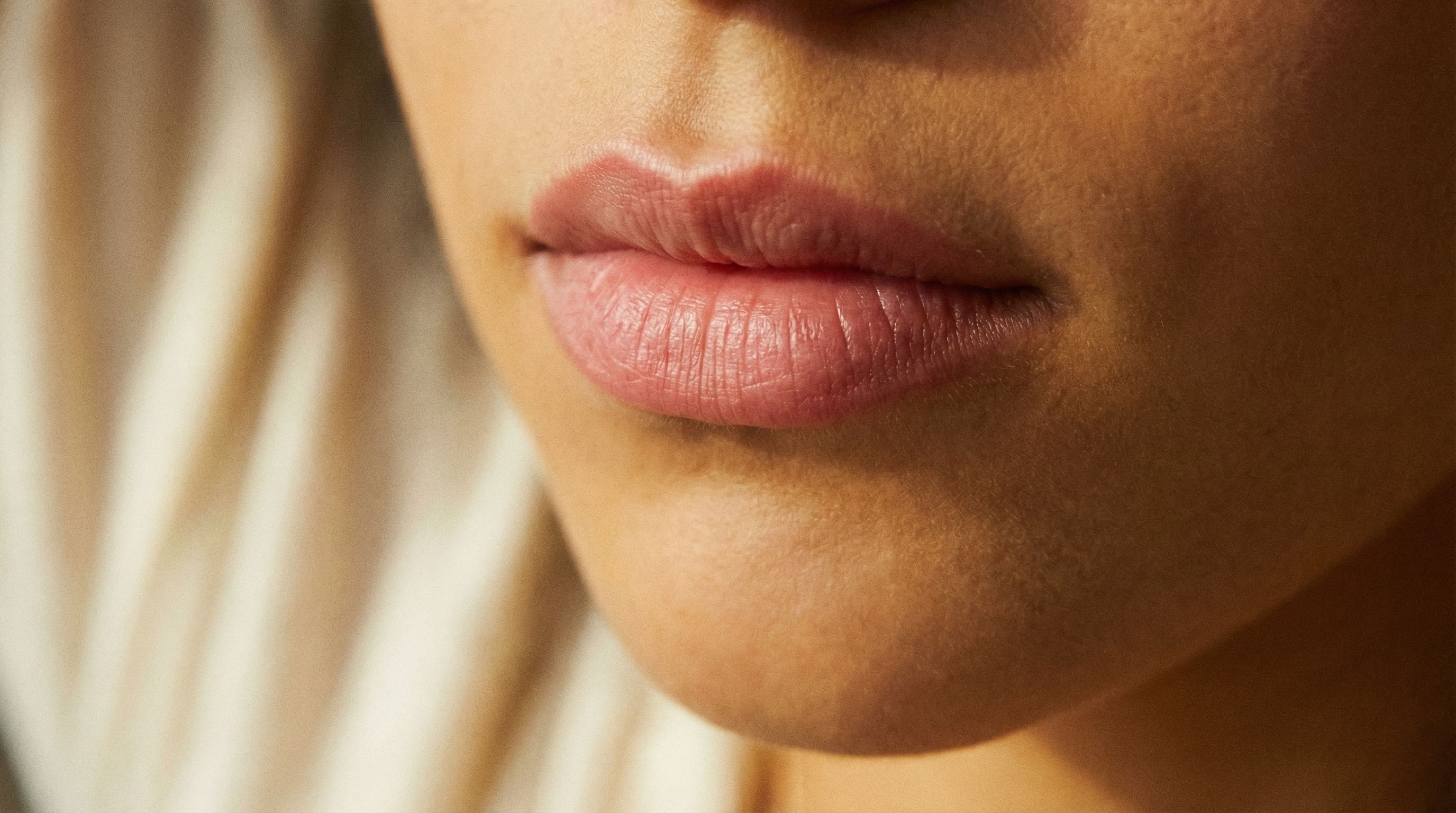 Close-up of lips showing the subtle enhancement from a Botox lip flip