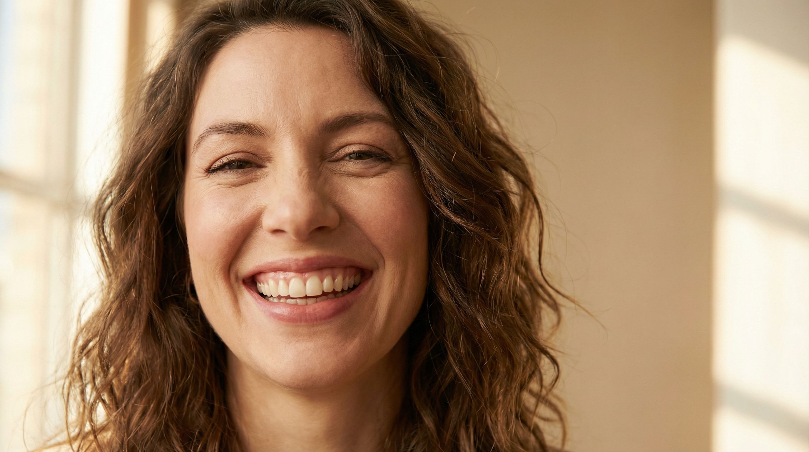 Woman's smile showing fuller upper lip after lip flip treatment